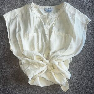 Yellow button down blouse